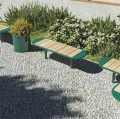Nordhavn 3 Seater Public Backless Bench in a gravel garden مع plant pots and greenery in the background.