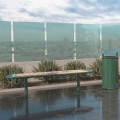 Nordhavn 4-Sitzer öffentliche Bank ohne Rückenlehne aus Metall auf Terrasse.