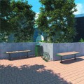 Support à 3 vélos Nordhavn installé sur une terrasse en pavés avec bancs et poubelle verts, vue en arrière-plan sur les arbres et la ville.