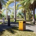 Gelber Nyboder Straße Abfalleimer in einem sonnigen Park mit Palmen.