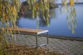 Frederiksberg 4 Seater Public Backless Bench by the lake with metal frame and wooden seat.