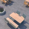 Bank Østerbro Rückenlehnenbank für 1 Person aus Holz und Metall auf Gehweg.