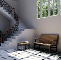 Hellerup Outdoor Stool placed in an elegant, sunlit interior by the staircase.