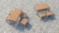 Moderner, hölzerner Hellerup Outdoor Hocker in einem Garten auf Pflastersteinen.