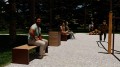 Öffentliche Sitzbank Indre By 3-Sitzer ohne Rückenlehne in einem Park.