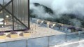 Indre By Outdoor-Pflanzkübel auf einer modernen Terrasse mit Pflanzen.