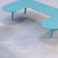 Turquoise U-shaped outdoor public bench without backrest Sydhavn Public Backless Bench.