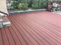 WPC Terrassendielen A10LL8, Stärke 2,5 cm, Länge 290 cm, auf einer Terrasse.