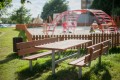 Outdoor Bench &amp; table (galvanized steel) set in a park near a playground.