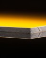 Gelbe HPL Platte Dicke 10 mm (M2), 1220x2440 mm, Nahaufnahme der Kante.