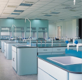 Laboratory with blue countertops and sinks showcasing workspace for experiments