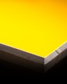 Sample of HPL PLATE YELLOW thickness 10 mm (50×50 MM) close-up image.