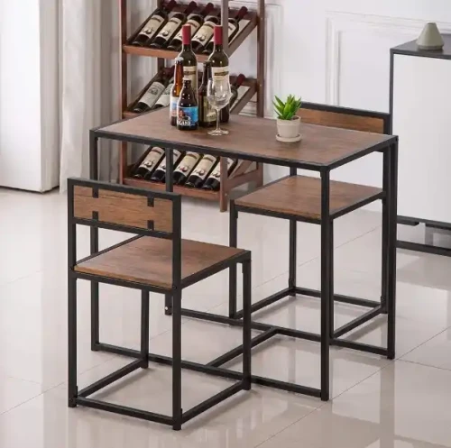 Compact dining room table and chairs set in modern space.