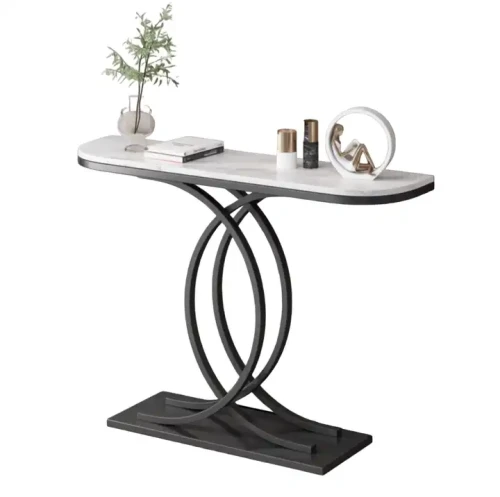 Table console moderne avec cadre en métal doré et décoration élégante.