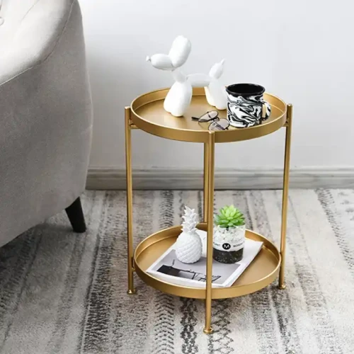 2 Tiers Round Coffee Table Decor For Small Space Metal Tea Table With Round Tray holding decor items next to a sofa