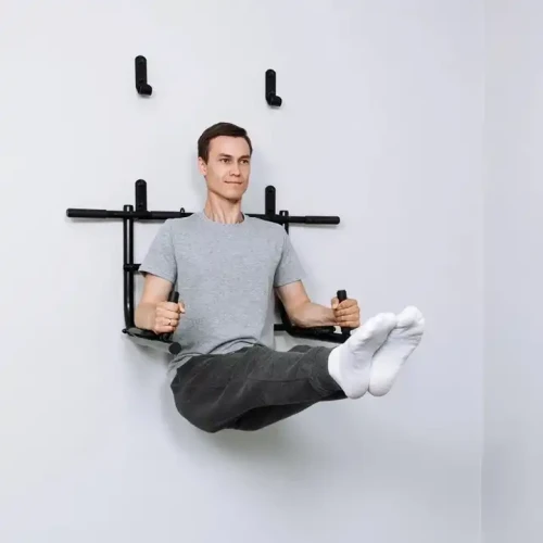 Man using Wall Mount Pull Up Bar in a home setting.
