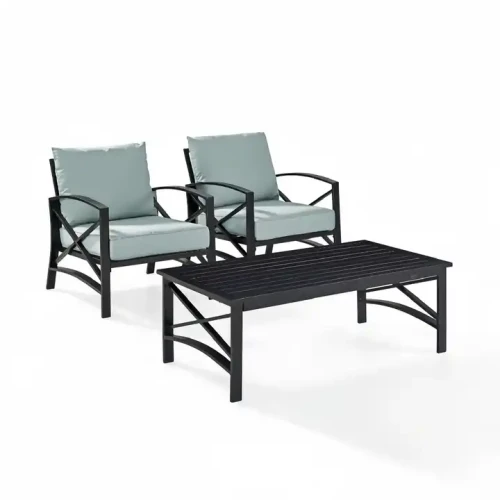 Set of black metal chairs for dining room with modern design, including a matching table.