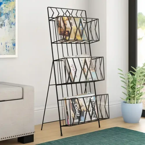 Top Selling Furniture Black Finish Metal Magazine Rack Stand Iron Art Newspaper Stand in modern living room.