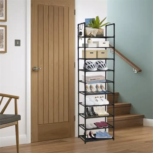 Black plastic tall closet organizer shoe rack with 10 tiers holding various shoes and boxes.