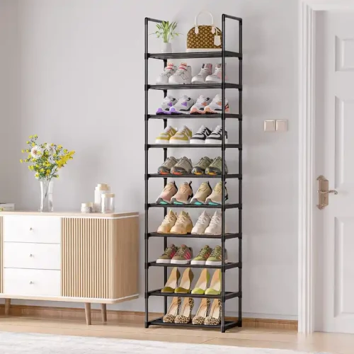 Shoe rack with metal frame storing various shoes, placed in a modern living room.