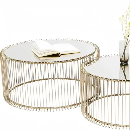 Luxury modern metal frame marble top coffee tables in a living room setup.