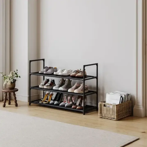 Indoor Space-saving Simple Design Home Furniture Metal Material Multi-layer Portable Shoe Rack filled with shoes.