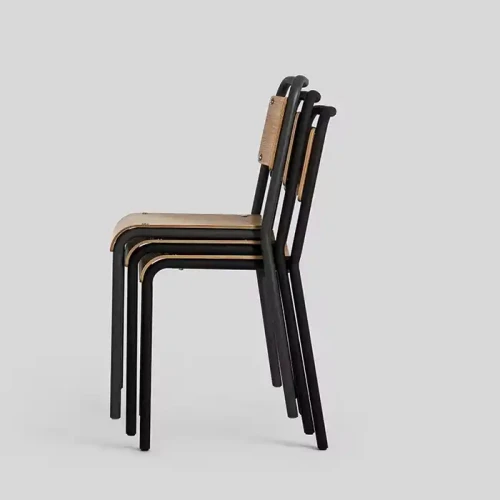 Stackable dining chairs with durable metal frame in modern contemporary style.