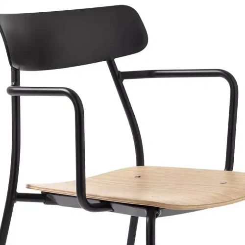Modern black metal frame dining chair with wooden seat.
