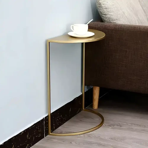 Modern Simple Design Half round Coffee Table with Mini Metal Frame and Marble Top placed beside a brown sofa.