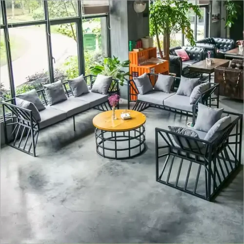 Modern Design Indoor 4 Pieces Home Furniture Metal Frame Sofa Set For Living Room For Home Hotel displayed in a stylish, spacious living room with large windows.