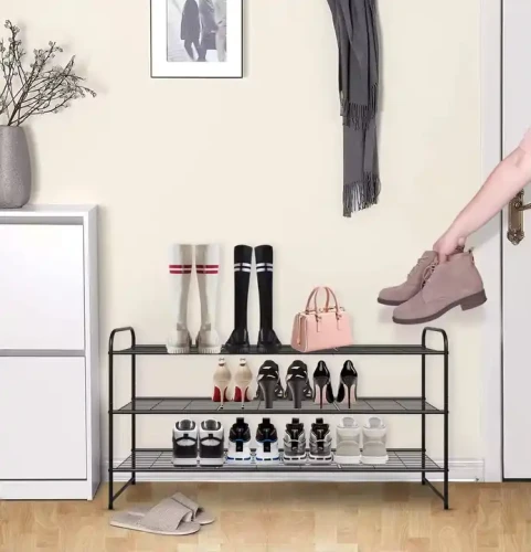 Modern Design Height Adjustable Indoor Home Furniture With Stackable Feature Metal Shoe Rack For Household Hotel Hostel with various shoes and a handbag.