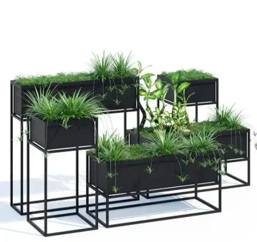 Custom metal wrought iron planters with green plants in a modern design display.