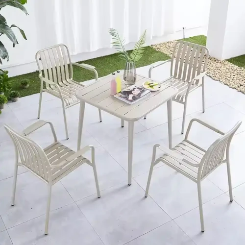 Outdoor metal dining chair set with table for Coffee Bistro Terrace Restaurant in garden.