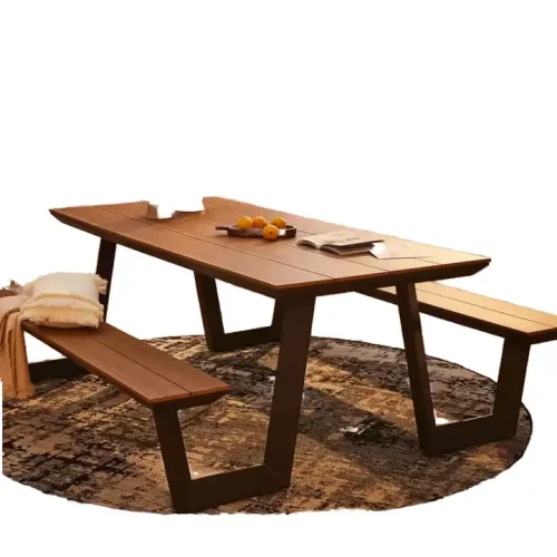 Mobilier de jardin moderne en métal avec table et bancs pour patio extérieur.