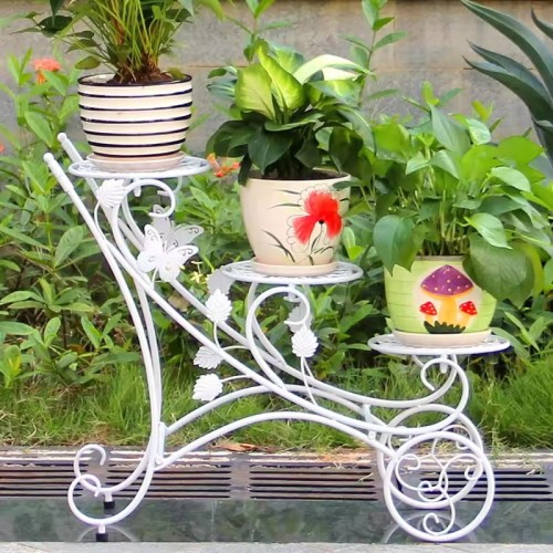 Decoration Planter Pots on white ornamental metal stand with plants