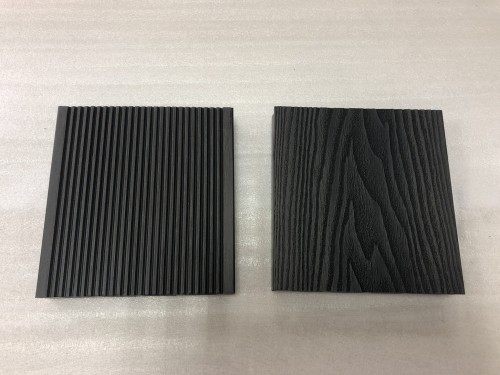 Two WPC TERRACE BOARDS / 3D10LL7 thickness 2.5 cm samples in black with different textures.