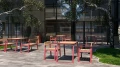 Outdoor cafe with Nørrebro Outdoor Table 150 cm 4-6 Seats and matching chairs.