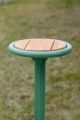 Nordhavn Outdoor Bar Stool with green frame and wooden seat.