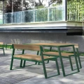Outdoor Nørrebro 3 Seater Public Backrest Bench in a modern garden setting.