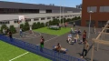Outdoor recreational area with a basketball court, table tennis, and Nordhavn Outdoor Bar Tables.