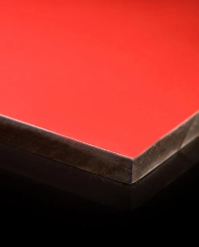 Red HPL plate with 10 mm thickness and 1300 mm dimensions for outdoor use.