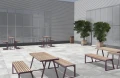 Amager Outdoor Planter in a modern outdoor seating area.
