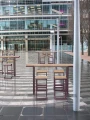 Amager Bar Set: Table and 4 Bar Stools in an outdoor setting.