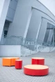 Valby Public Backless Bench | Quarter Round in modern outdoor setting