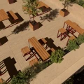 Outdoor seating area with Frederiksberg Outdoor Bar Table w/ Footrest.