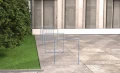 Østerbro Bike Stand in front of a modern building.