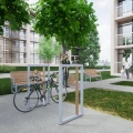 Hellerup Cykelstativ | Lodret monteret i et boligområde med cykel parkeret i stativet.