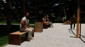 People sitting on Indre By 3 Seater Public Backless Benches in a park.