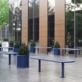 Sydhavn Outdoor Planter | 55 l on a modern patio with benches