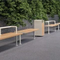 Holmen 3 Seater Public Backless Bench in a park setting.